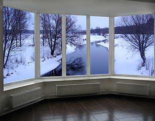 Image showing windows of room overlooking the winter river