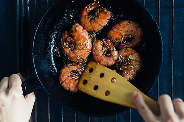Image showing Shrimp fried with garlic and sesame seeds