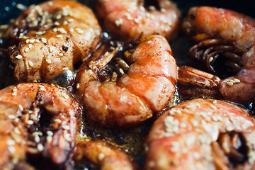 Image showing Shrimp fried with garlic and sesame seeds