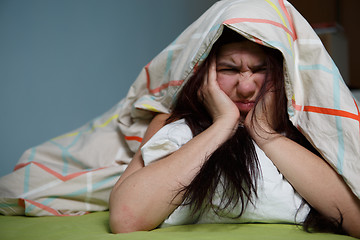 Image showing Woman with blanket under her head