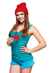 Image showing Teen bright girl holding credit card