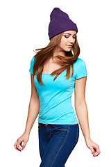 Image showing Smiling teen girl standing in hat