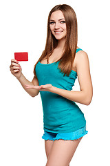 Image showing Teen bright girl holding credit card