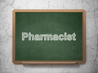 Image showing Healthcare concept: Pharmacist on chalkboard background