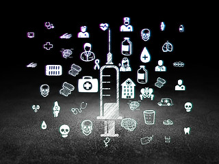 Image showing Health concept: Syringe in grunge dark room