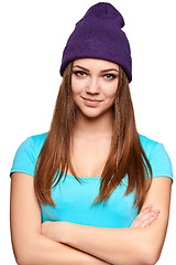 Image showing Smiling teen girl standing in hat