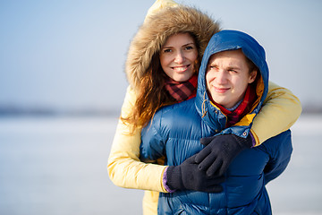 Image showing beautiful couple embracing in winter