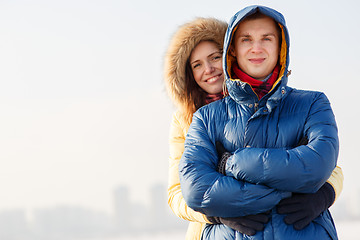 Image showing Young couple together at outdoor in winter