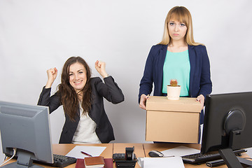 Image showing Office worker rejoices that fired colleague