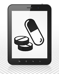Image showing Medicine concept: Tablet Pc Computer with Pills on display