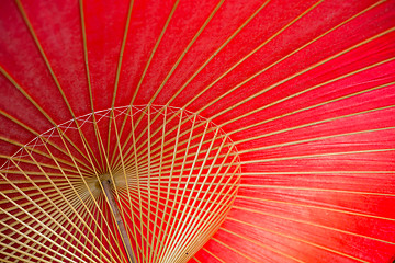 Image showing Red bamboo umbrella