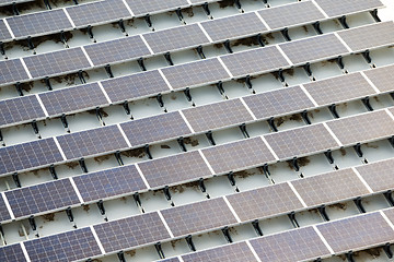 Image showing Blue solar panels on roof top