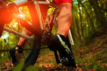 Image showing cyclist riding mountain bike on rocky trail