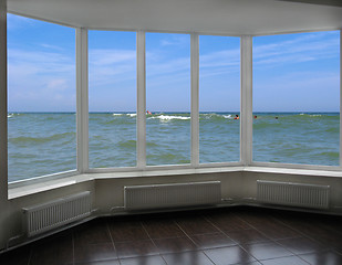 Image showing plastic window with view of marine waves