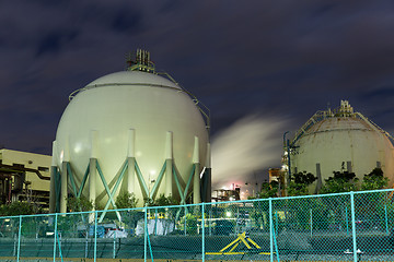 Image showing Natural Gas storage tanks at night