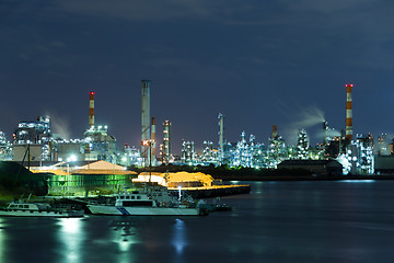 Image showing Seaside Industrial Factory working at night