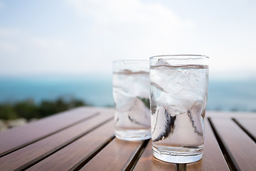 Image showing Glass of water at outdoor restaurant