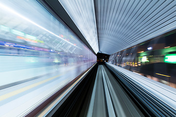 Image showing Fast light trails in train