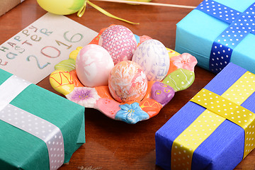 Image showing holiday gift box with painted easter eggs