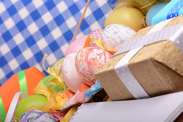 Image showing Easter background with eggs, ribbons and spring decoration