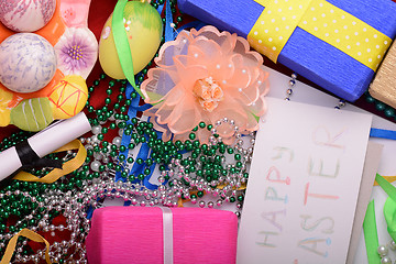 Image showing Easter background with eggs, ribbons and spring decoration