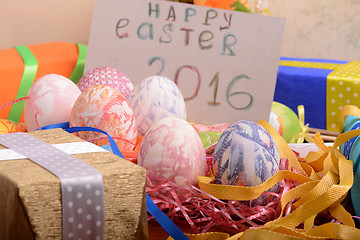 Image showing Easter background with eggs, ribbons and spring decoration