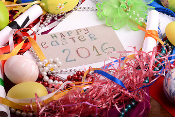 Image showing Easter background with eggs, ribbons and spring decoration