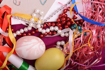 Image showing Easter background with eggs, ribbons and spring decoration