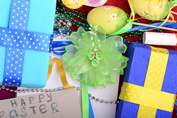 Image showing Easter background with eggs, ribbons and spring decoration