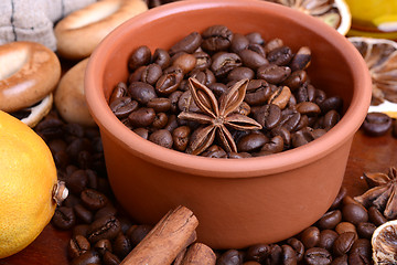 Image showing Vintage still life with coffee beans on wooden background