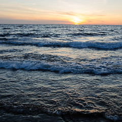 Image showing Twilight with sunset and waves