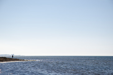 Image showing Man silhouette by the coast