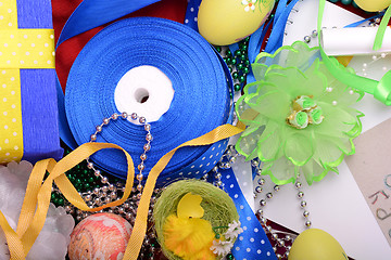 Image showing Easter background with eggs, ribbons and spring decoration