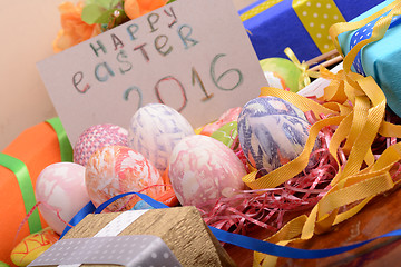 Image showing Easter background with eggs, ribbons and spring decoration