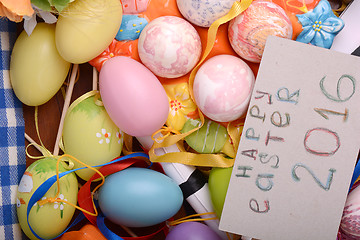 Image showing Easter background with eggs, ribbons and spring decoration