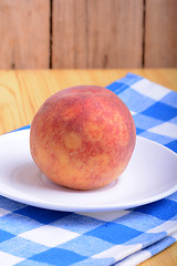 Image showing fresh peach on white plate