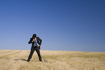 Image showing a businessman taking a call