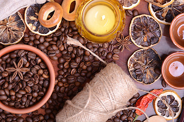 Image showing Vintage still life with coffee beans on wooden background