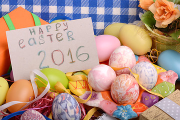 Image showing Easter background with eggs, ribbons and spring decoration