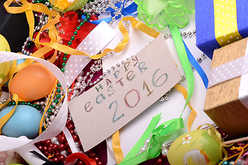 Image showing Easter background with eggs, ribbons and spring decoration