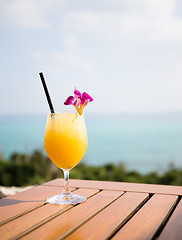 Image showing Orange juice on table