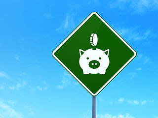 Image showing Money concept: Money Box With Coin on road sign background