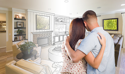 Image showing Military Couple Looking Over Living Room Design Drawing Photo Co