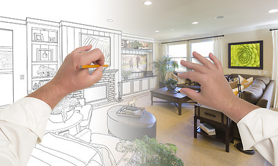 Image showing Hands Drawing Living Room Design Gradating Into Photograph