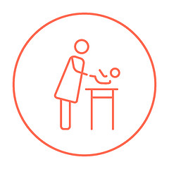 Image showing Mother taking care of baby line icon.