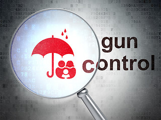 Image showing Protection concept: Family And Umbrella and Gun Control with optical glass