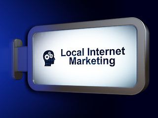 Image showing Marketing concept: Local Internet Marketing and Head With Gears on billboard background