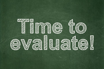 Image showing Time concept: Time to Evaluate! on chalkboard background