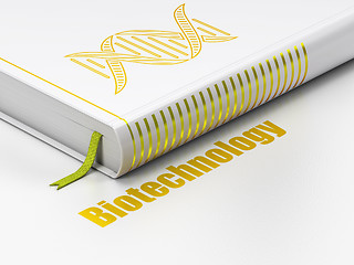 Image showing Science concept: book DNA, Biotechnology on white background