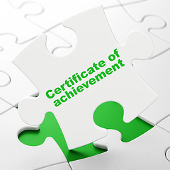 Image showing Studying concept: Certificate of Achievement on puzzle backgroun